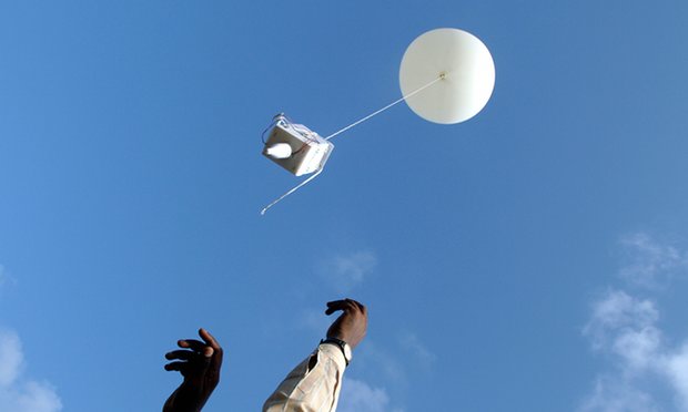 Indian meteorologists release a balloon in order to track monsoons. Photograph: Adeel Halim/Reuters. Source: httpswww.theguardian.com/news/2015/dec/20/you-still-cant-beat-radiosonde